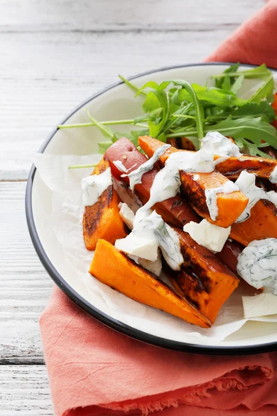 Baked yam with sauce — Stock Photo, Image