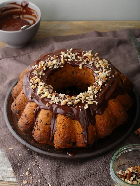 Chocolate bundt cake with nuts — Stock Photo, Image