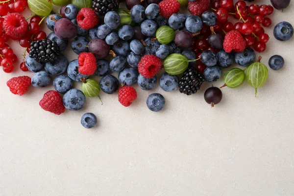 Fresh berries mix on concrete background — Stock Photo, Image