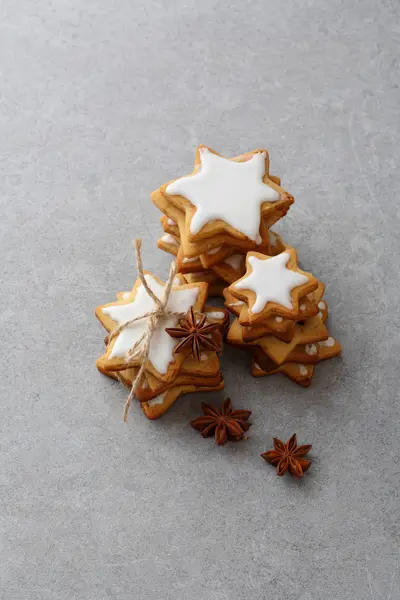 Cookies with icing for christmas on concrete — Stock Photo, Image