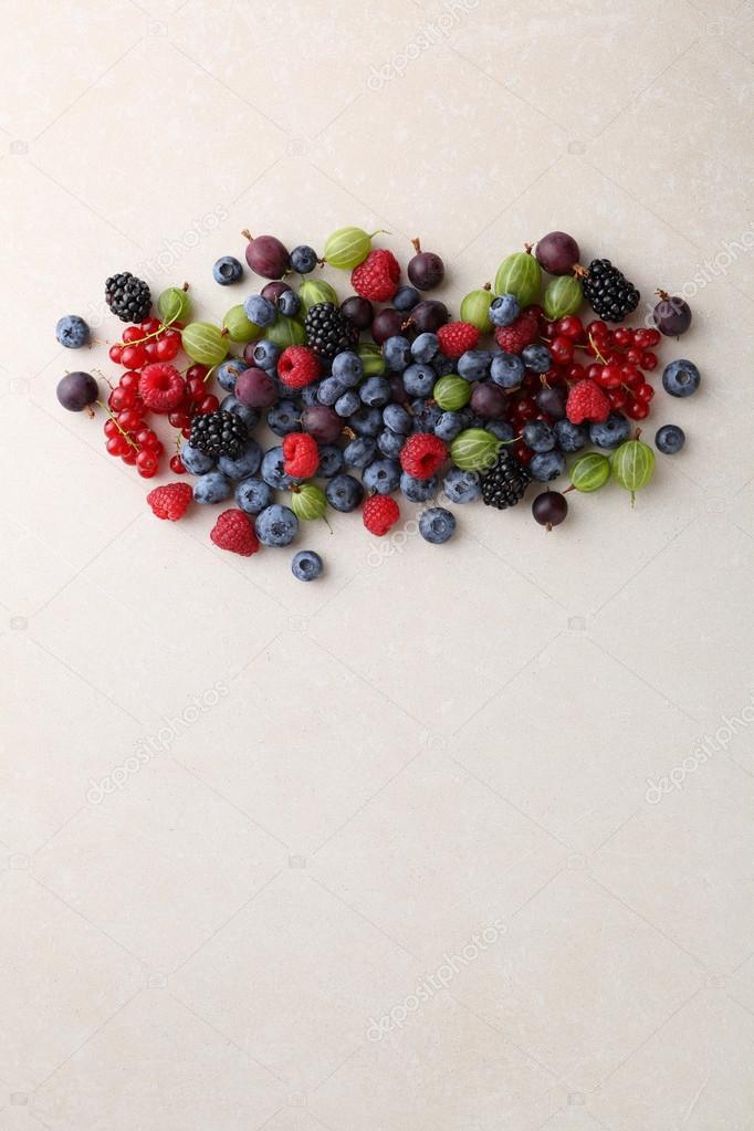 Fresh berries on concrete