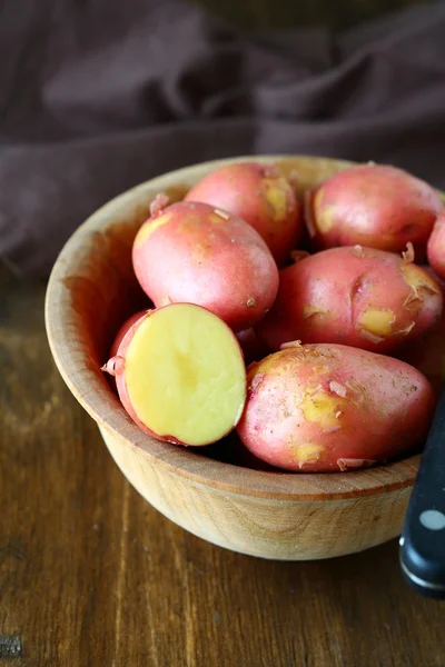 New potatoes in a rustic bowl — Stock Photo, Image