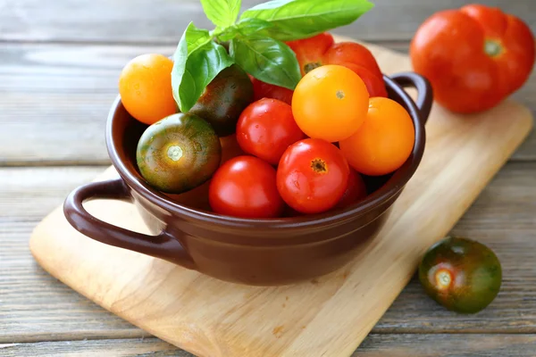 Tomato red, yellow, olive in bowl — Stock Photo, Image