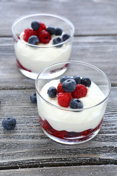 Two glasses of yogurt with berries — Stock Photo, Image