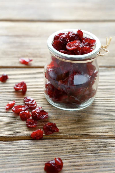 Cranberries in a small jar — Stock Photo, Image