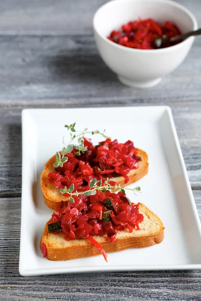 Two bruschetta on a plate — Stock Photo, Image