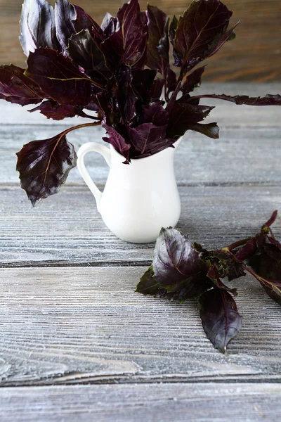Fresh fragrant basil in a jug — Stock Photo, Image