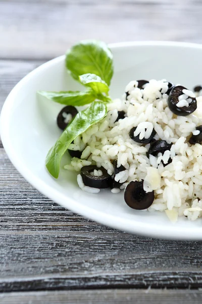 Rice with basil leaves — Stock Photo, Image