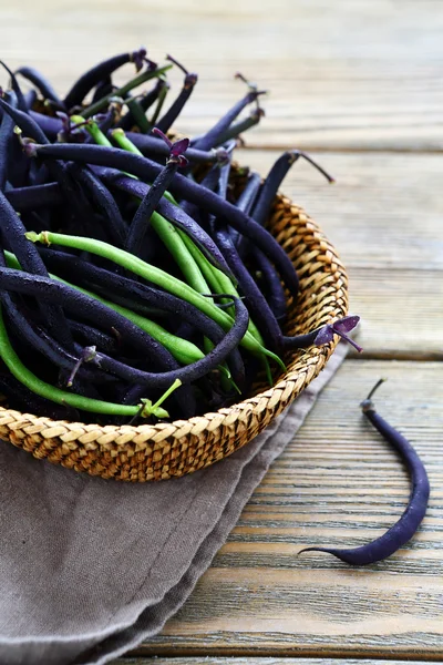 Beans in a wooden basket — Stock Photo, Image
