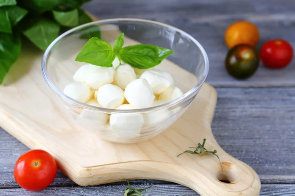 Mozzarella in a transparent bowl — Stock Photo, Image