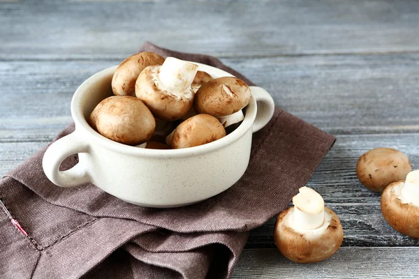 Raw mushrooms in a bowl — Stock Photo, Image
