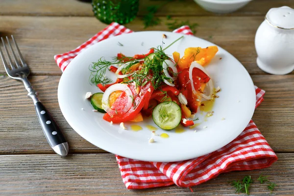Salad with fresh cucumbers and tomatoes — Stock Photo, Image
