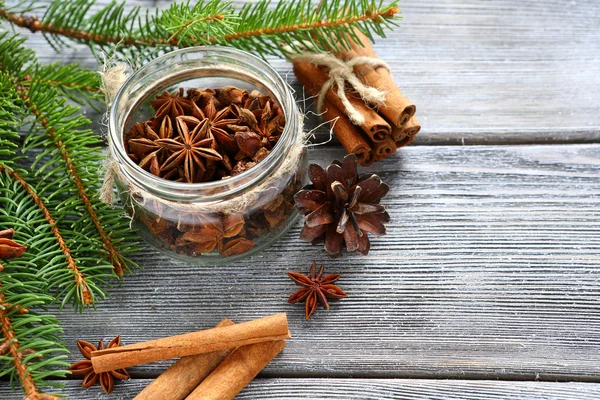 Cinnamon sticks and Anise in a jar — Stock Photo, Image