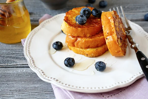 French toast with blueberries on a plate — Stock Photo, Image