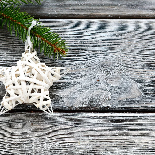 Christmas star on the branch of a pine — Stock Photo, Image