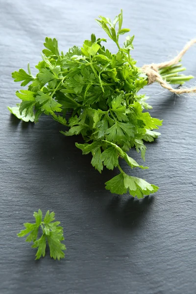 Fragrant parsley on a slate — Stock Photo, Image