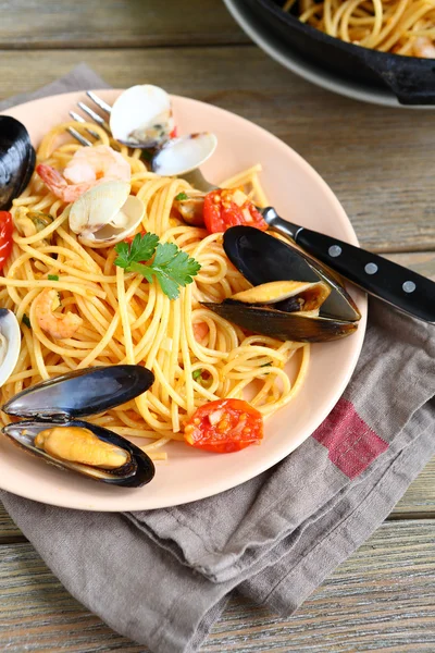 Tasty pasta with mussels and squid — Stock Photo, Image