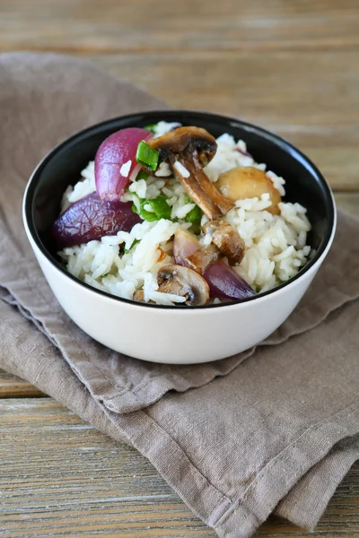 Tasty rice with mushrooms and onions — Stock Photo, Image