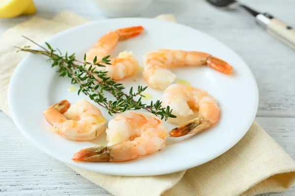 Shrimp and thyme on plate — Stock Photo, Image