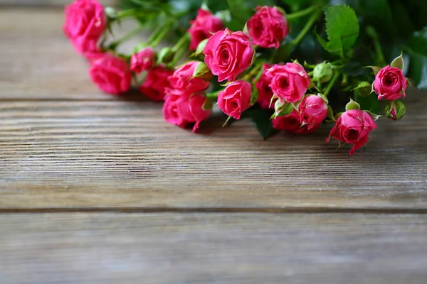 Malé růže na desky — Stock fotografie