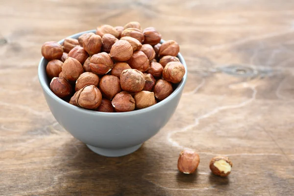 Hazelnuts in a bowl — Stock Photo, Image