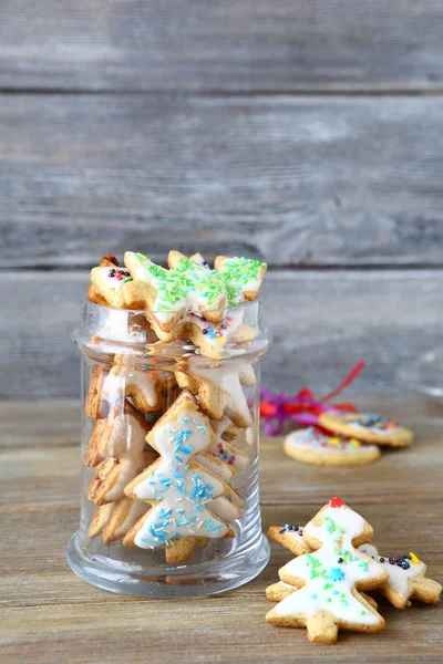 Christmas cookies with glaze in a jar — Stock Photo, Image