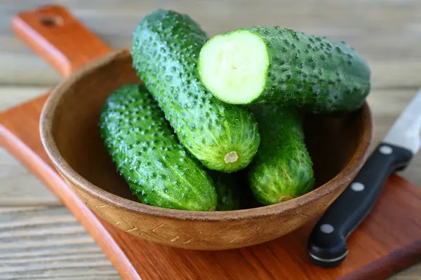 Fresh delicious cucumber in a bowl — Stock Photo, Image