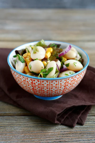 Salad of beans, onions, and corn in a bowl — Stock Photo, Image