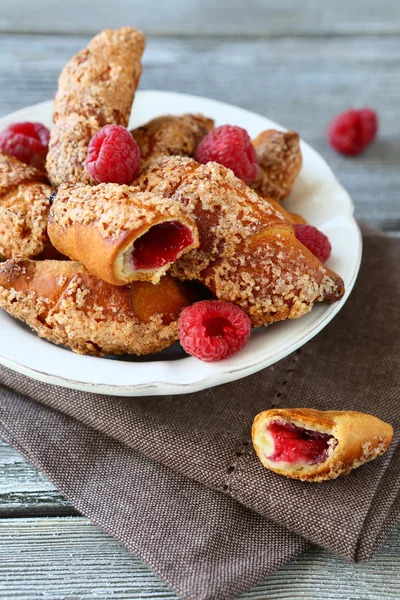 Croissants with raspberries — Stock Photo, Image