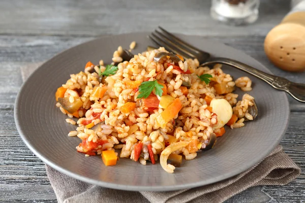 Pilaf with vegetables on a plate — Stock Photo, Image