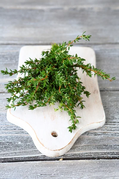 Thyme on cutting board — Stock Photo, Image