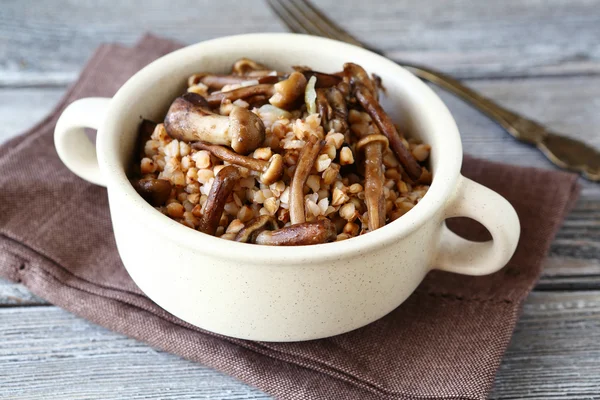 Buckwheat with mushrooms in a bowl — Stock Photo, Image