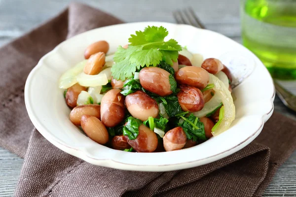 Delicious beans with onion and cilantro — Stock Photo, Image