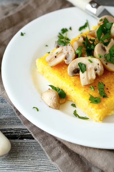 Nutritional polenta with roasted mushrooms — Stock Photo, Image