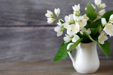 White flowers in a vase clipart