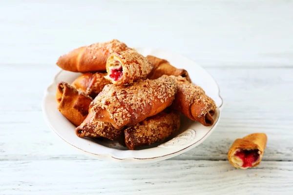 Delicious croissant on a white plate — Stock Photo, Image