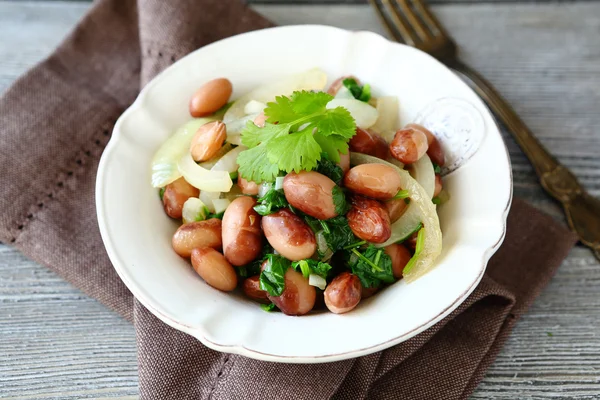 Cooked beans with  fried onion and cilantro — Stock Photo, Image