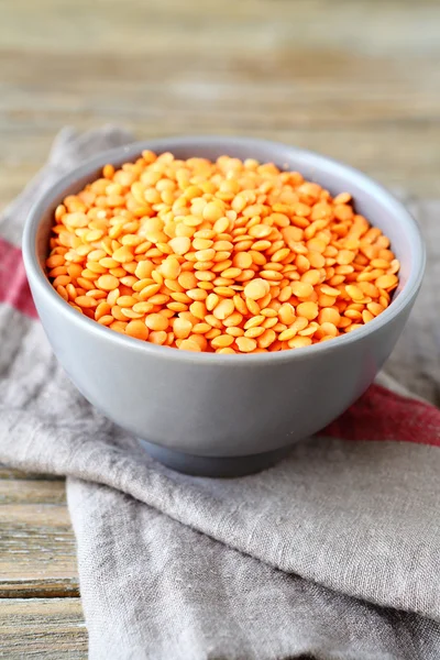 Uncooked lentils in a bowl — Stock Photo, Image