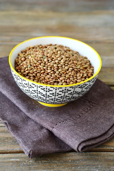Green lentils in a bowl — Stock Photo, Image