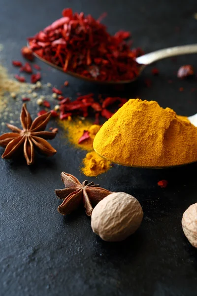 Paprika and turmeric in a spoon — Stock Photo, Image