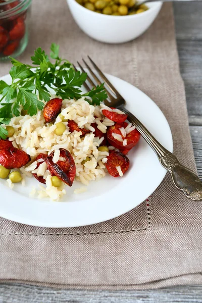 Rice with sun-dried tomatoes in a plate — Stock Photo, Image