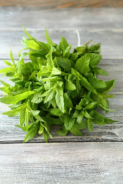 Bunch of mint on the boards — Stock Photo, Image