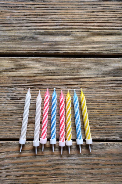 Candle on a wooden boards — Stock Photo, Image