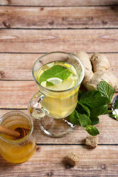 Ginger tea on the boards — Stock Photo, Image