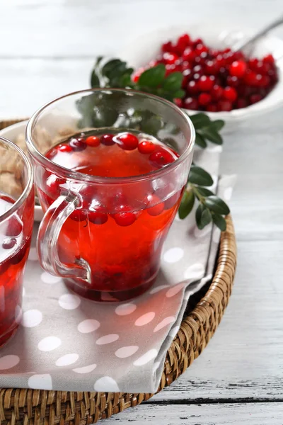 Tea made from cranberry on tray — Stock Photo, Image