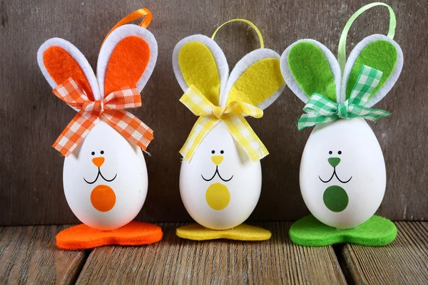 Three Easter bunny on the boards — Stock Photo, Image