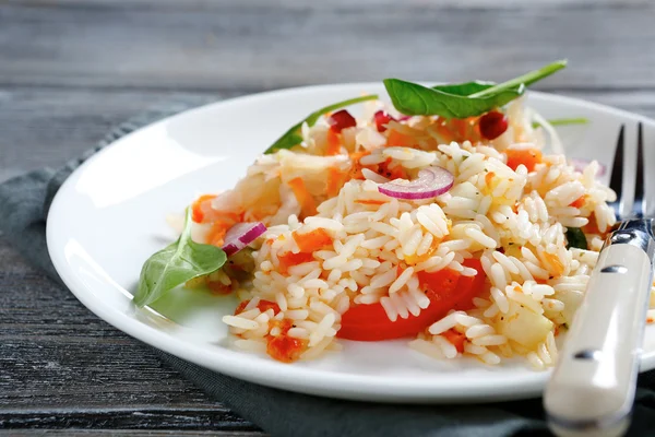 Delicious rice with onions and basil — Stock Photo, Image