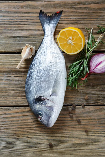Raw fish on the boards — Stock Photo, Image