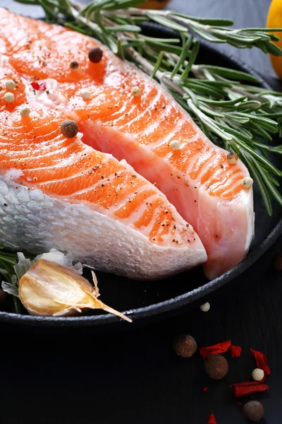 Fresh salmon on pan — Stock Photo, Image