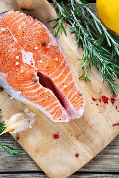 Nutritional salmon on the board — Stock Photo, Image
